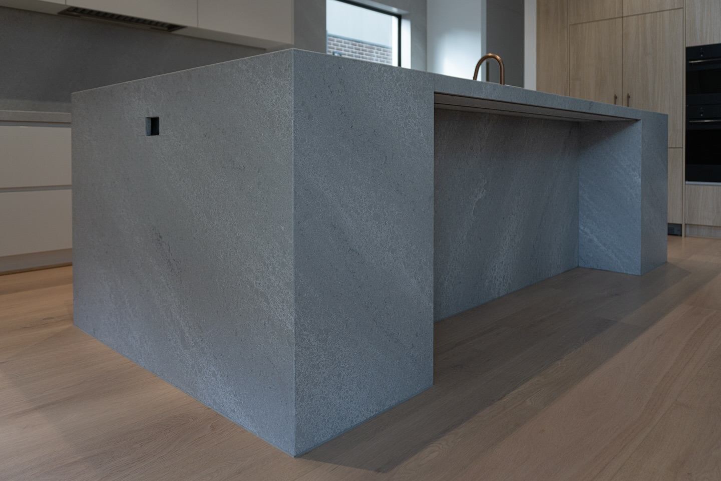 Detail of Angel Falls stone benchtop corner and waterfall edge