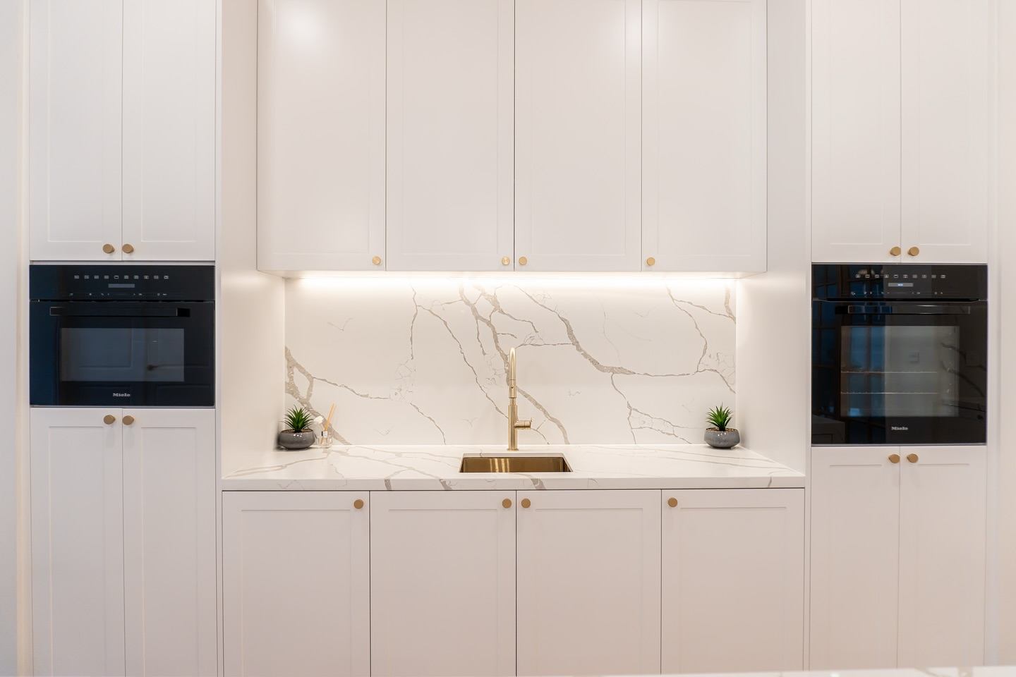 Calacatta Laza stone benchtop in a modern kitchen design